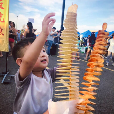 Ottawa Asian Fest - Child Grabbing Potato Skewer
